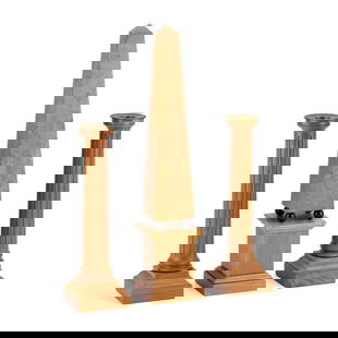DAVID LINLEY A SYCAMORE AND WALNUT OBELISK TABLE ORNAMENT AND A PAIR OF CANDLESTICKS: DAVID LINLEY A SYCAMORE AND WALNUT OBELISK TABLE ORNAMENT AND A PAIR OF CANDLESTICKS each stamped LINLEY. (3) Obelisk 46cm