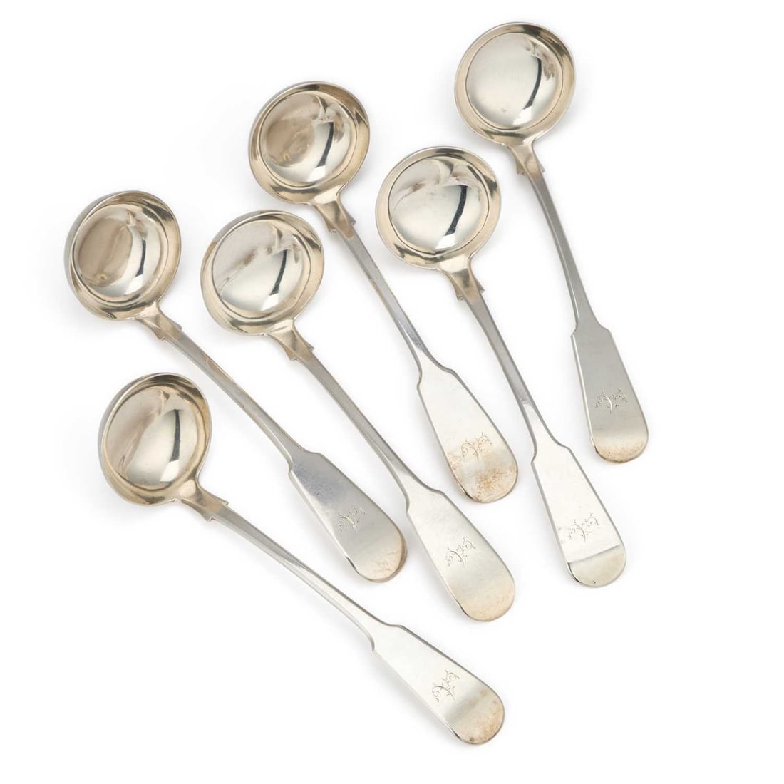A SET OF SIX VICTORIAN SCOTTISH SILVER TODDY LADLES: A SET OF SIX VICTORIAN SCOTTISH SILVER TODDY LADLES by John Murray or John Muir, Glasgow 1840 and 1841, Fiddle pattern, each engraved with an A. (6) 17.5cm long, 9.8 troy ounces gross