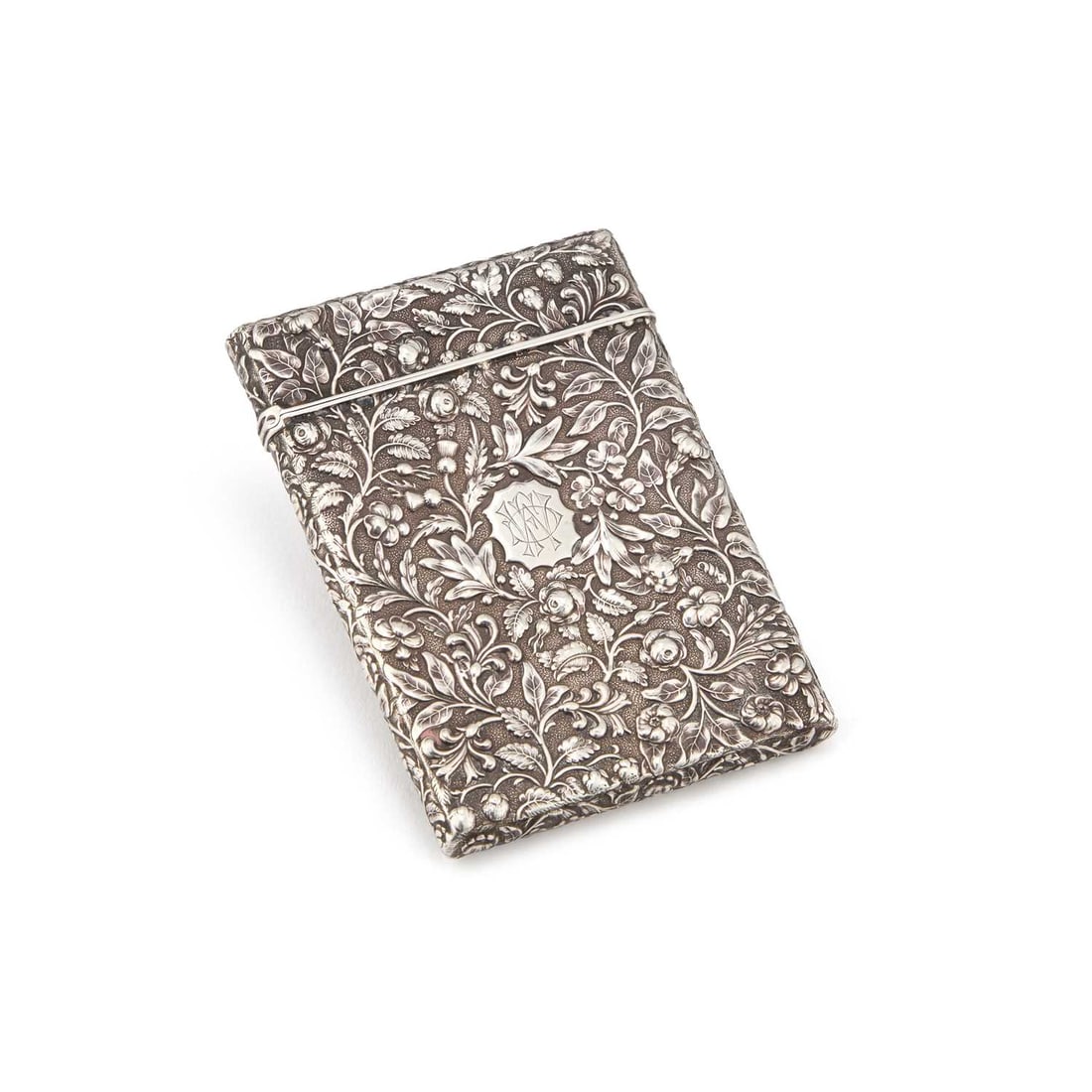 A VICTORIAN SILVER CARD CASE: A VICTORIAN SILVER CARD CASE by Yapp & Woodward (John Yapp & John Woodward), Birmingham 1848, rectangular form, heavily decorated with scrolling flowers, thistles, strawberries and clover, eng
