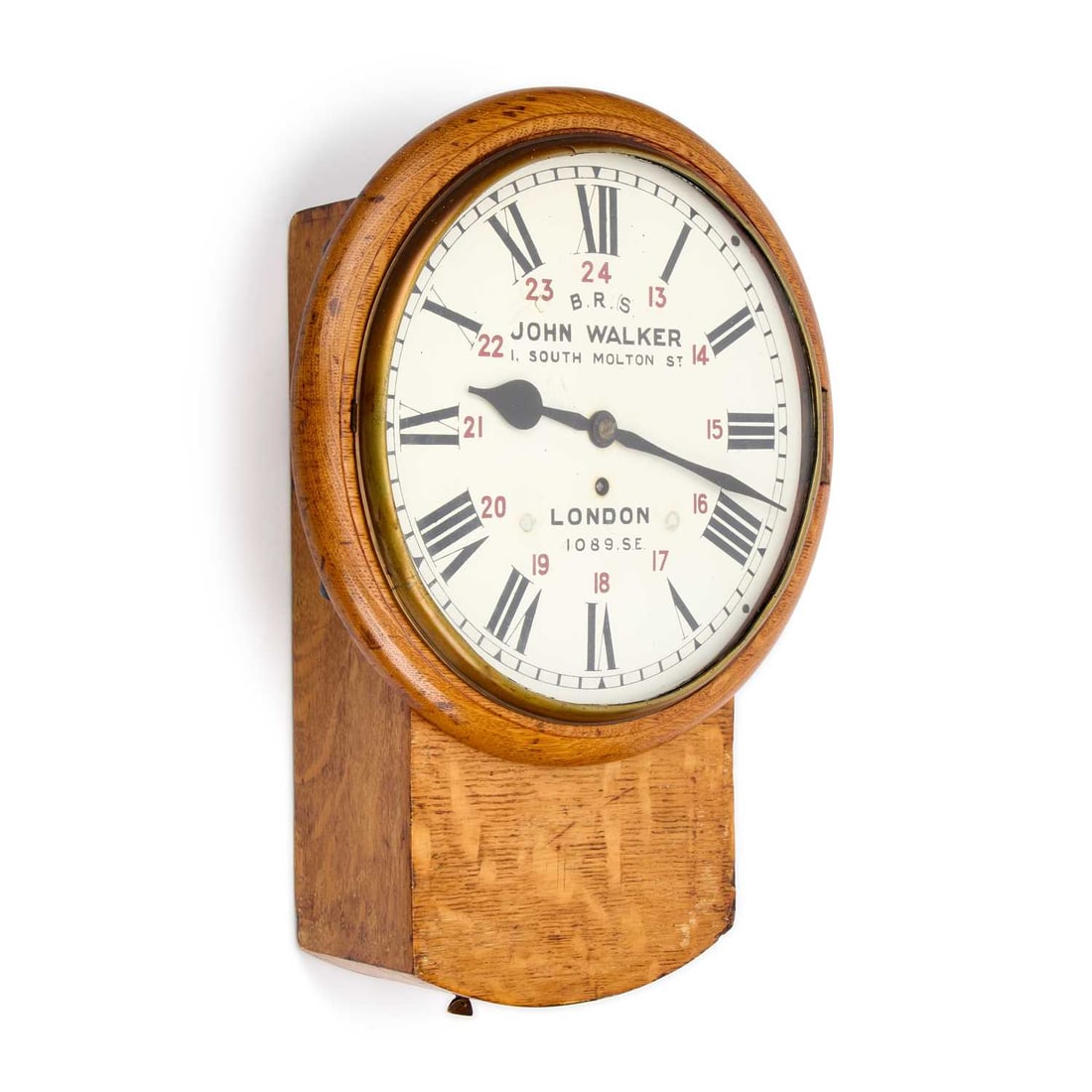 AN ENGLISH OAK-CASED DROP-DIAL SINGLE-FUSEE RAILWAY CLOCK SIGNED B.R.(S), JOHN WALKER, 1 SOUTH: AN ENGLISH OAK-CASED DROP-DIAL SINGLE-FUSEE RAILWAY CLOCK SIGNED B.R.(S), JOHN WALKER, 1 SOUTH MOLTON ST, LONDON, 1089 S.E. the 12-inch dial with Roman numerals, the hinged side door applied with a br