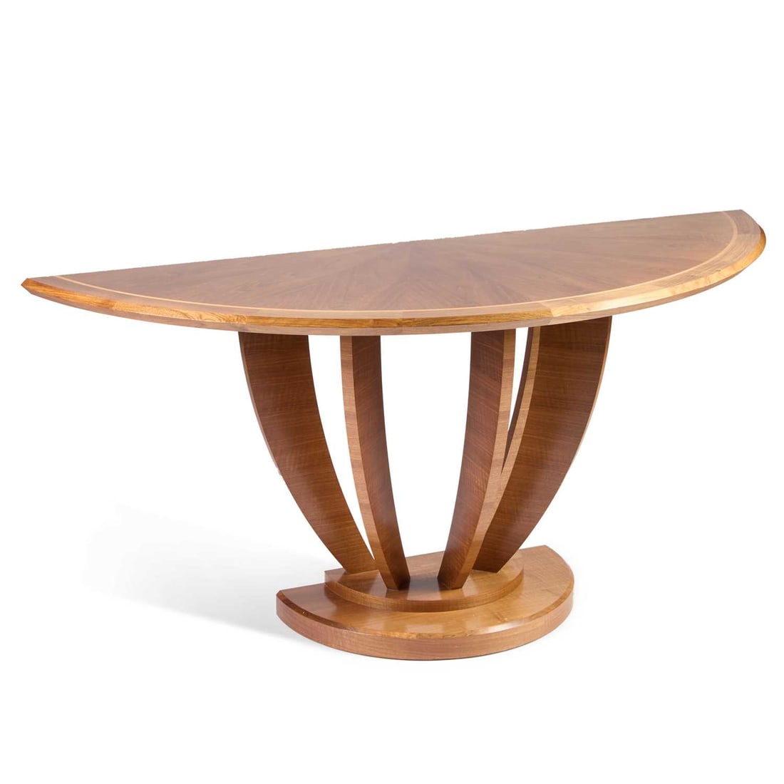 A CONTEMPORARY WALNUT DEMILUNE CONSOLE TABLE: A CONTEMPORARY WALNUT DEMILUNE CONSOLE TABLE the substantial inlaid top raised on five arched supports issuing from a conforming base. 90cm high, 192cm wide, 73.5cm deep