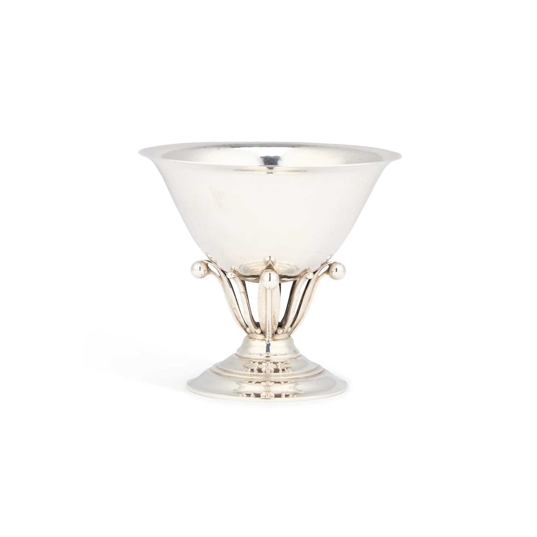 JOHAN ROHDE FOR GEORG JENSEN, A DANISH STERLING SILVER BOWL: JOHAN ROHDE FOR GEORG JENSEN, A DANISH STERLING SILVER BOWL import marks, George Stockwell, London 1931, no. 17A, the bell-shaped bowl surmounted on vertical alternating foliate forms with berry finia