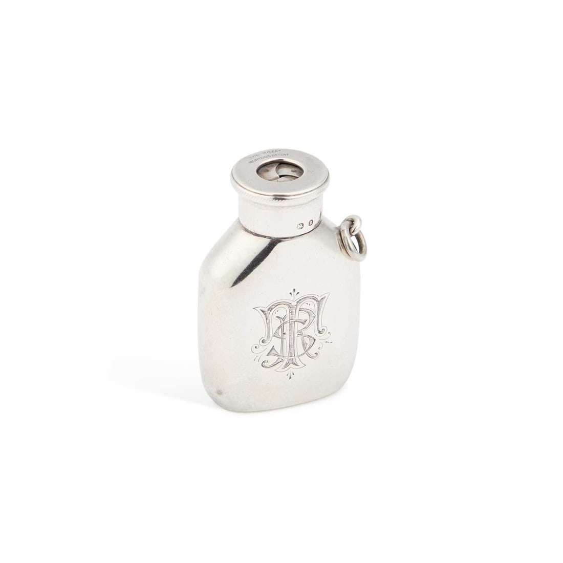 A LATE VICTORIAN SILVER VESTA CASE THE "MAZE" MORTON'S PATENT: A LATE VICTORIAN SILVER VESTA CASE THE "MAZE" MORTON'S PATENT by M & C, Birmingham 1895, the bottle with an unusual swivel-open top, engraved with a monogram. 5.2cm high There are two small dents