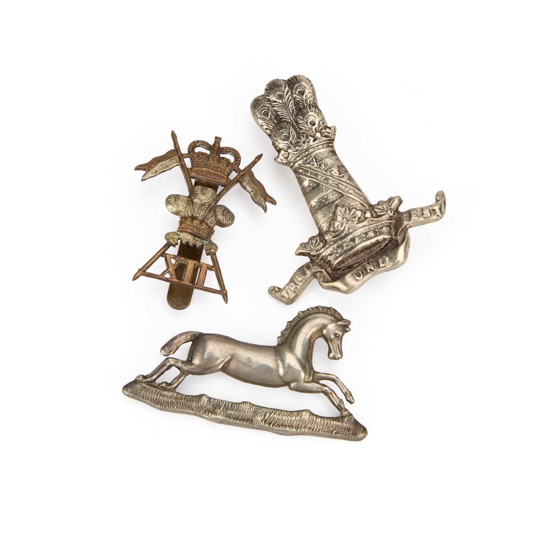 THREE CAVALRY CAP BADGES