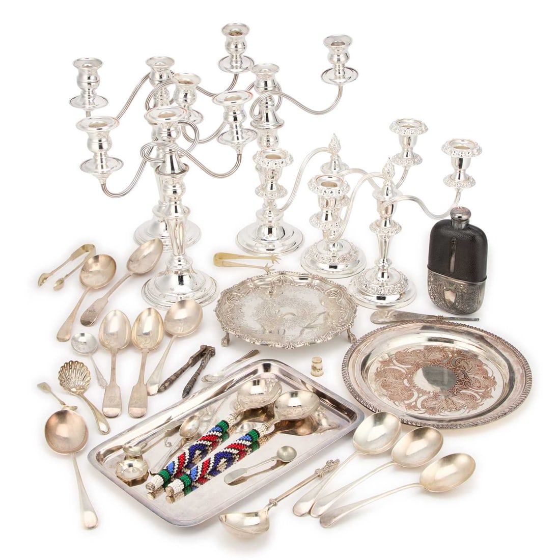 A LARGE COLLECTION OF SILVER-PLATE: A LARGE COLLECTION OF SILVER-PLATE including a two pairs of candelabra, a spirit flask, etc. (Qty) Tallest candelabra 32cm