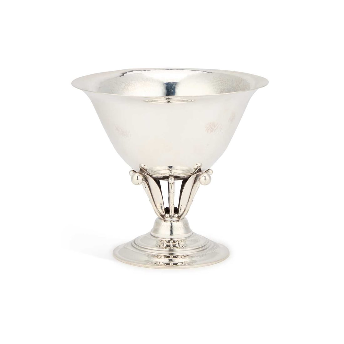 JOHAN ROHDE FOR GEORG JENSEN, A DANISH STERLING SILVER BOWL: JOHAN ROHDE FOR GEORG JENSEN, A DANISH STERLING SILVER BOWL no. 17B, the bell-shaped bowl surmounted on vertical alternating foliate forms with berry finials, on a circular foot. 13.5cm high, 9.6 troy