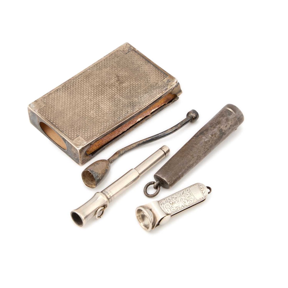 A GROUP OF SILVER TOBACCIANA: A GROUP OF SILVER TOBACCIANA including a cigar cutter, cigar piercer, silver matchbox sleeve, etc. (5) Matchbox sleeve 8cm by 5cm, 2.9 troy ounces gross