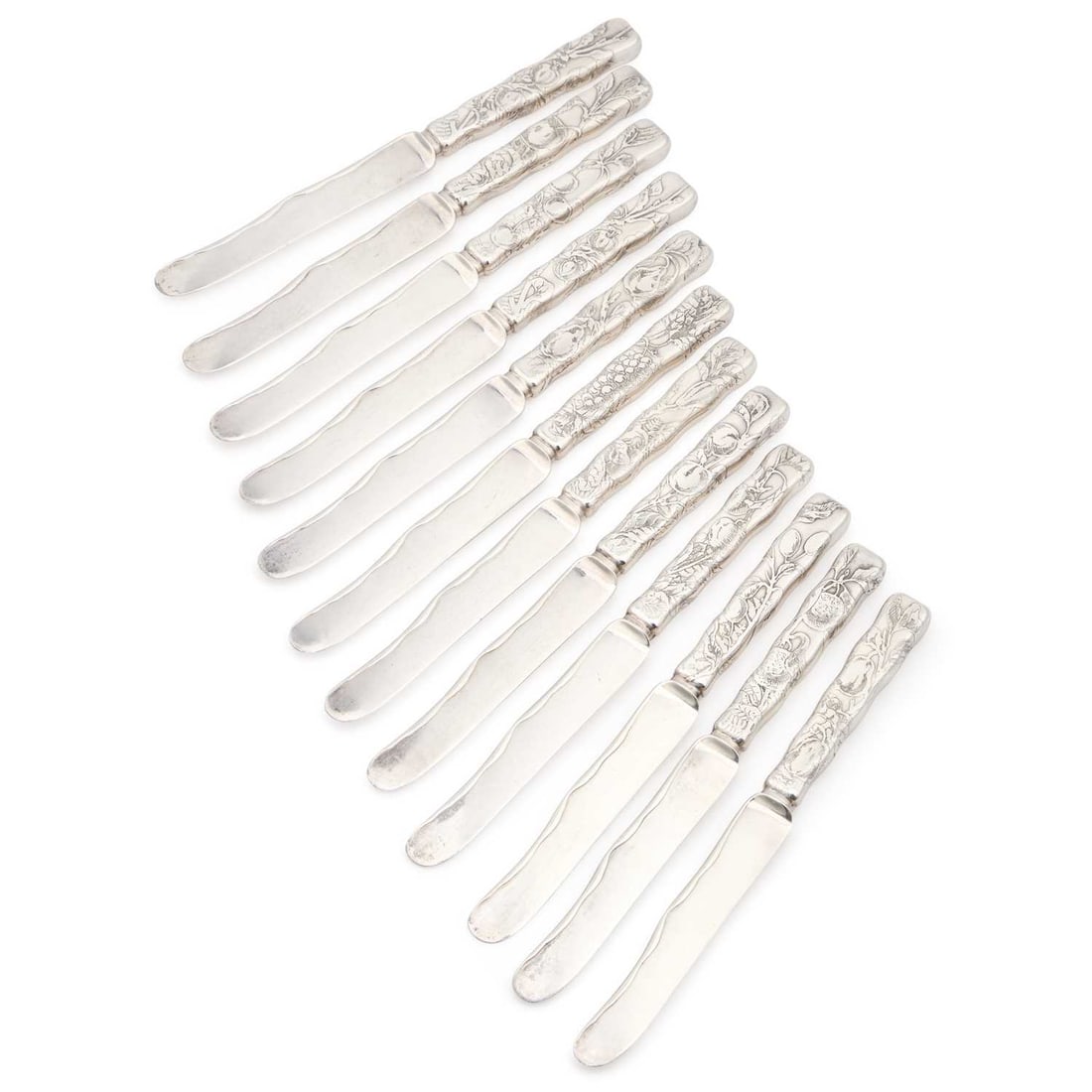 A SET OF TWELVE AMERICAN STERLING SILVER 'LAP-OVER-EDGE' DESSERT KNIVES (1 of 2)