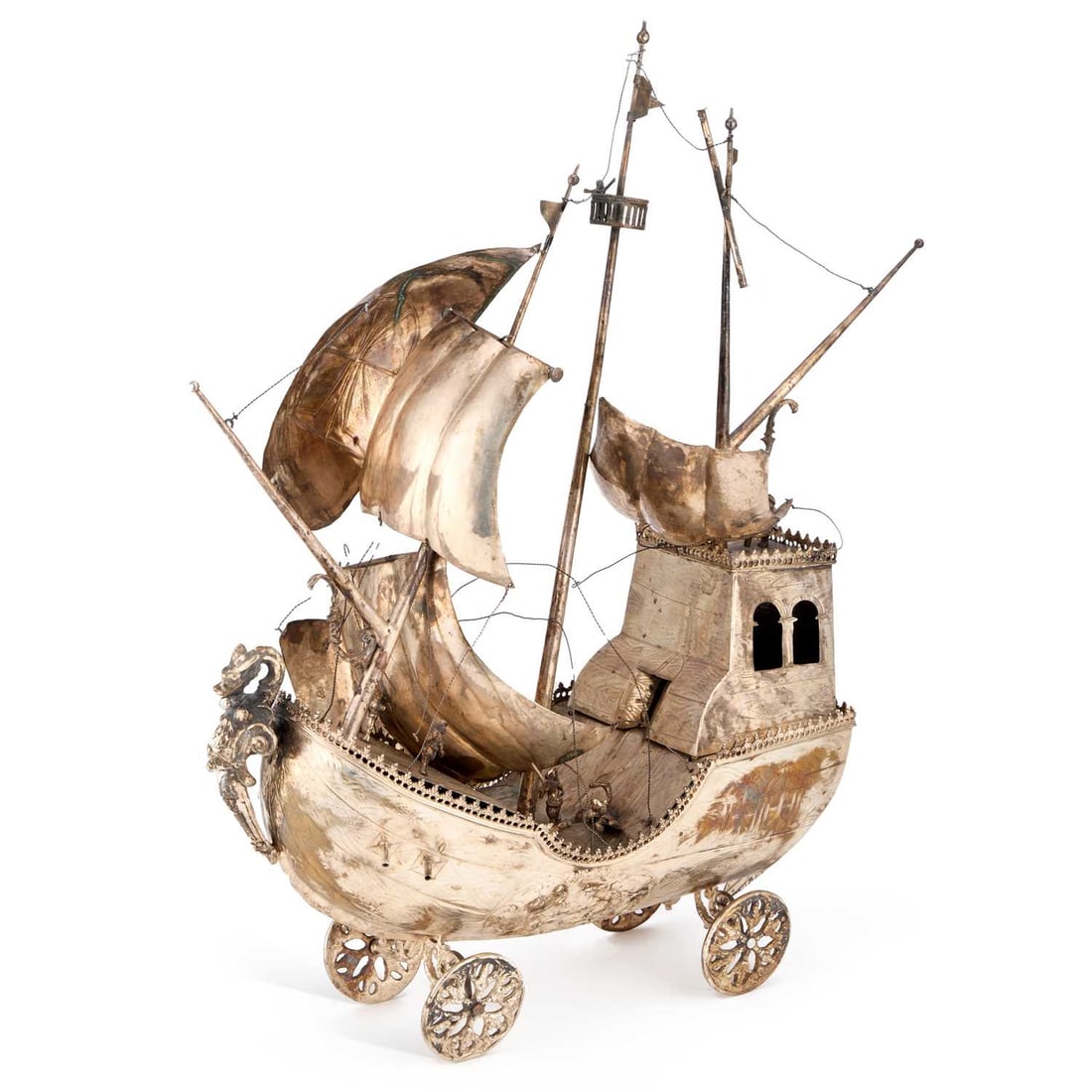 A LARGE CONTINENTAL WHITE METAL NEFF: A LARGE CONTINENTAL WHITE METAL NEFF probably Dutch or German, late 19th Century, the galleon in full sail, moving on four openwork wheels. 59cm high