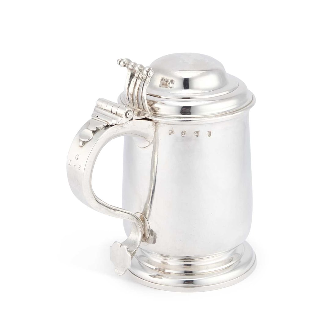 A GEORGE I SILVER TANKARD: A GEORGE I SILVER TANKARD by Benjamin Blakely, London 1726, of gently tapering cylindrical form with a rounded base upon a spreading circular foot. 20cm high, 30.8 troy ounces