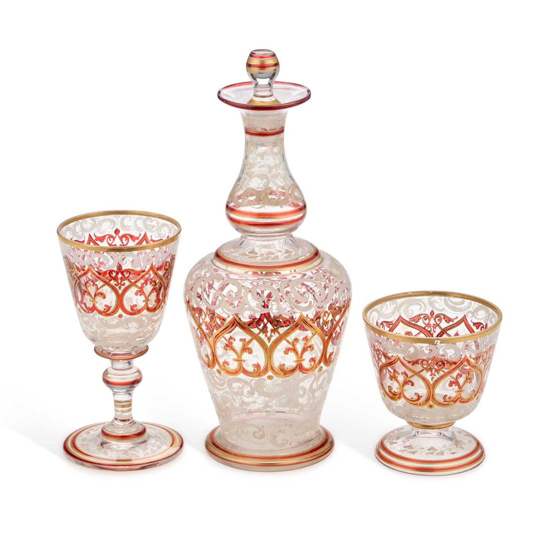 A BOHEMIAN GILT AND ENAMELLED GLASS DECANTER AND TWO GLASSES 19TH CENTURY (1 of 1)
