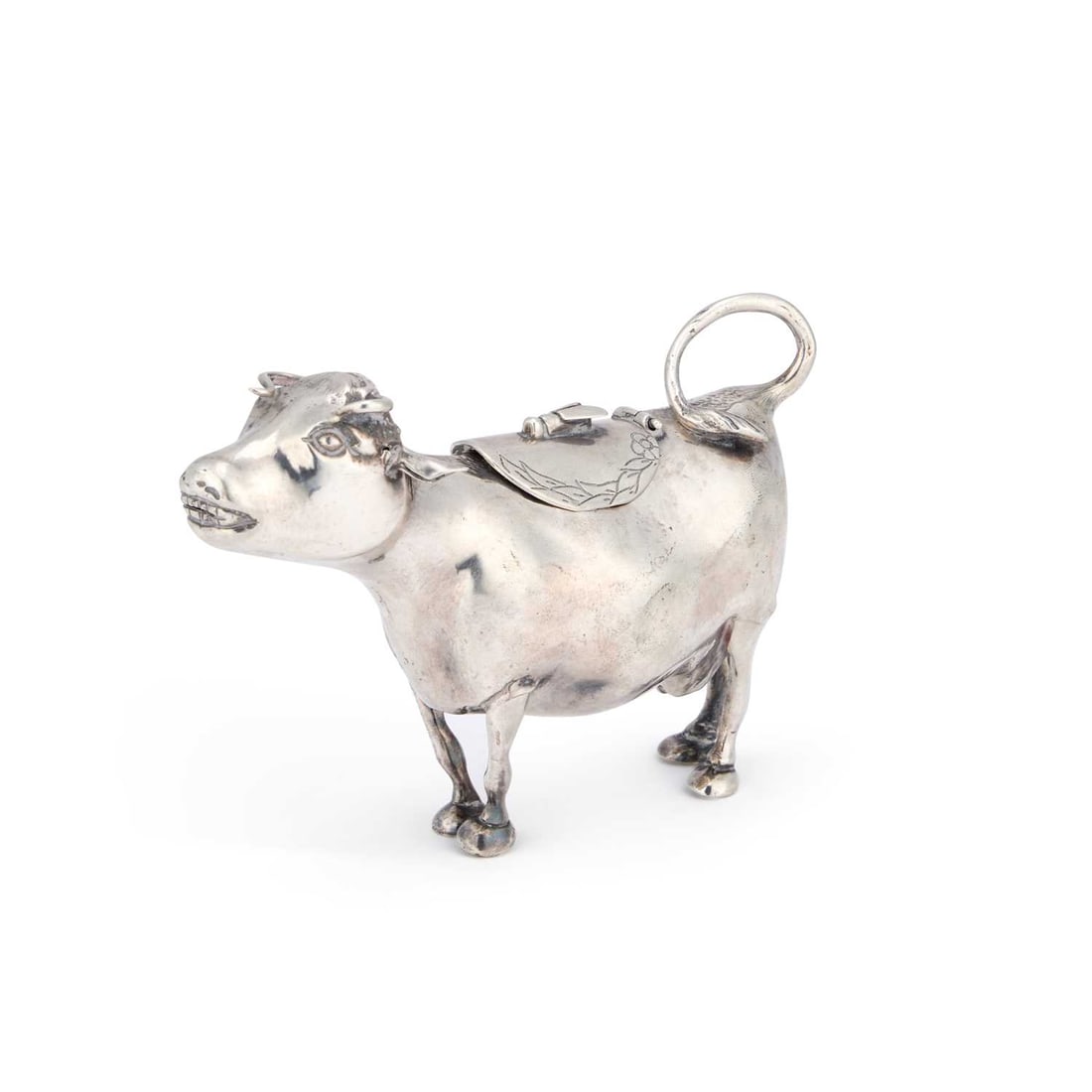 A 19TH CENTURY CONTINENTAL SILVER COW CREAMER (1 of 3)