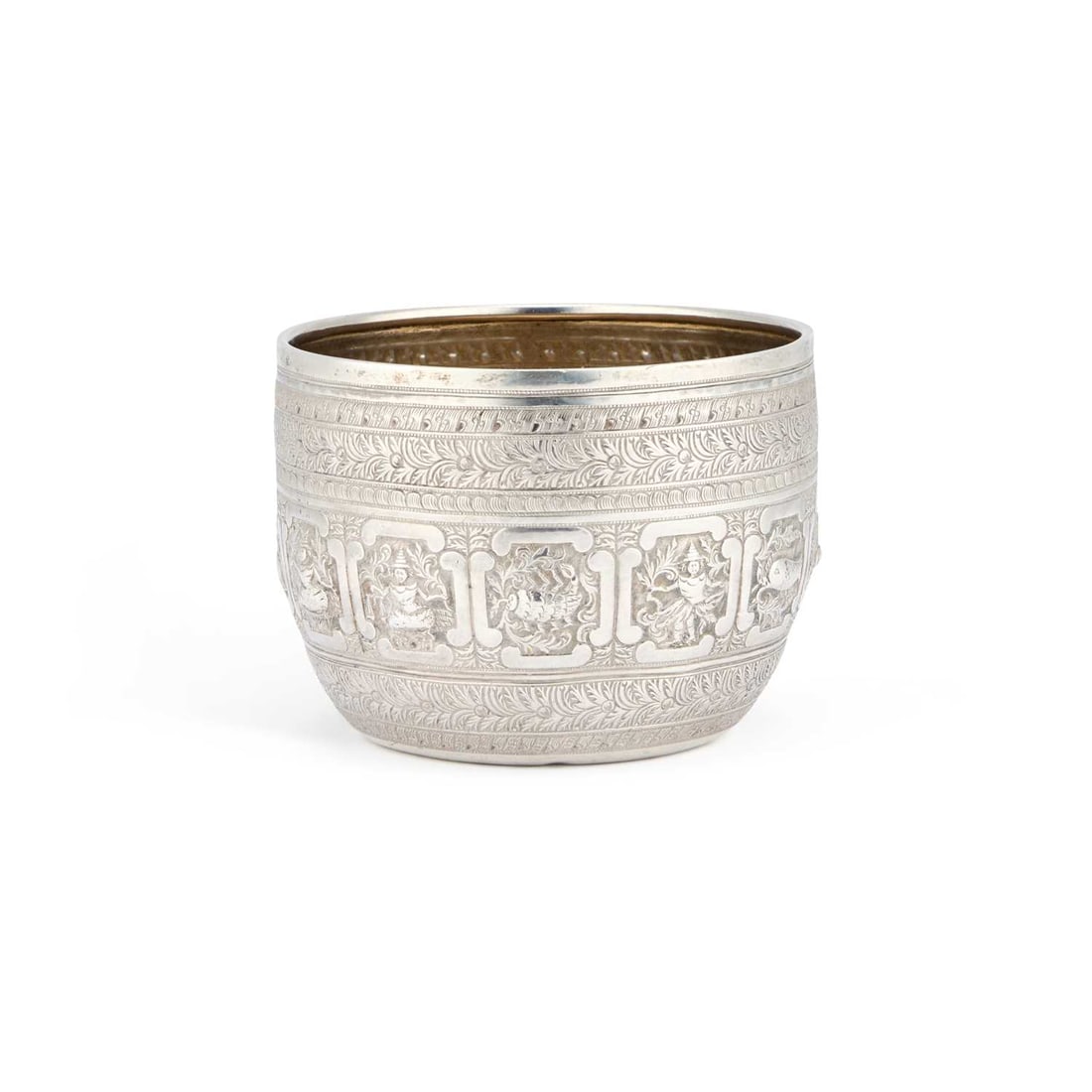 A VICTORIAN SILVER 'BURMESE' BOWL: A VICTORIAN SILVER 'BURMESE' BOWL by George Fox, London 1857, the sides with embossed and chased panels of the twelve signs of the zodiac, January – Makaya (half fish, half elephant), February – K
