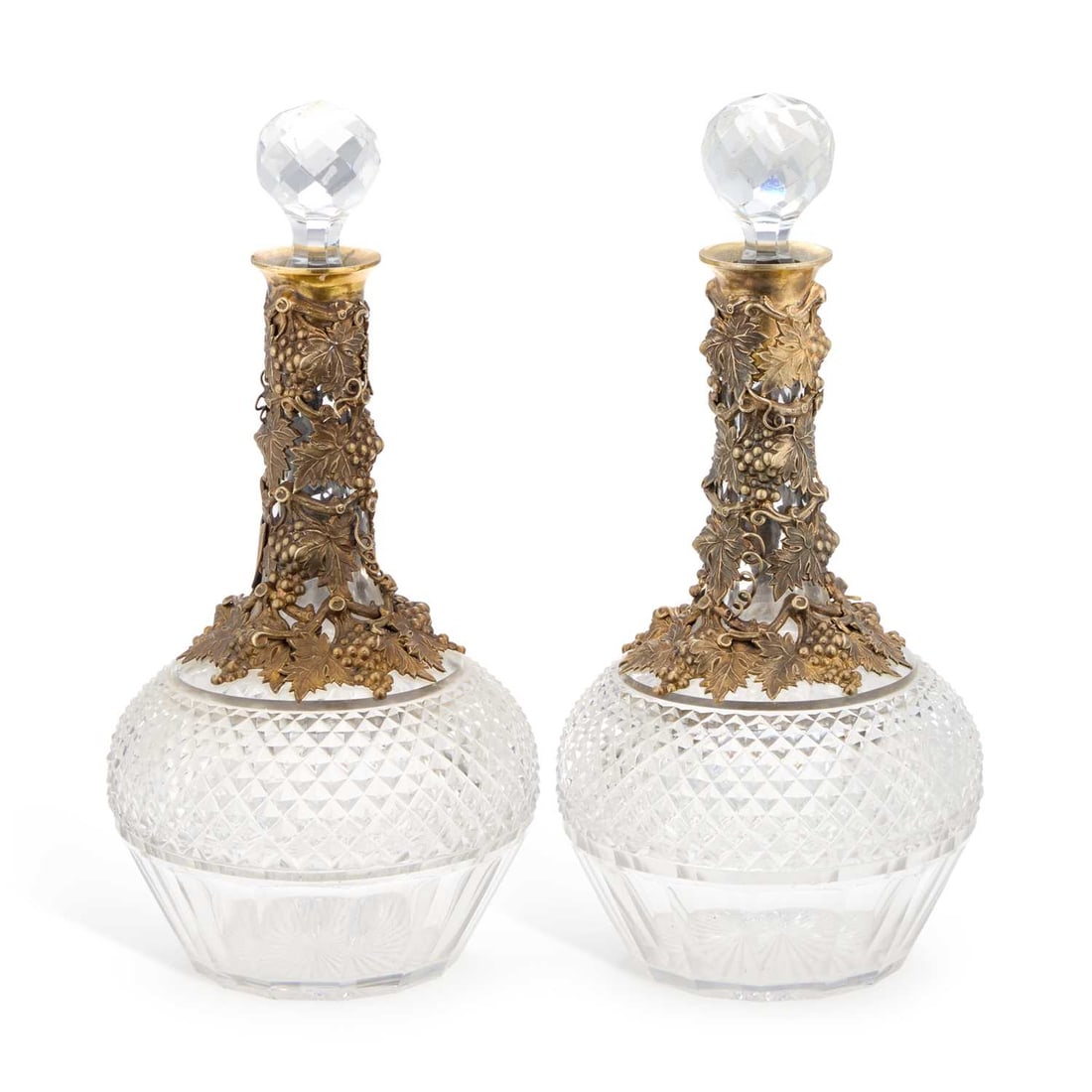 A PAIR OF 19TH CENTURY GILT-METAL MOUNTED CUT-GLASS DECANTERS (1 of 1)