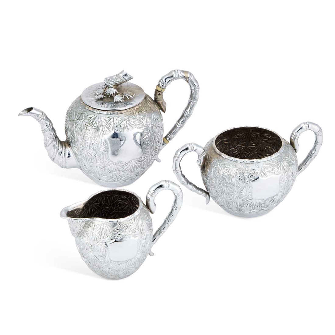 § A CHINESE SILVER THREE-PIECE TEA SERVICE (1 of 2)