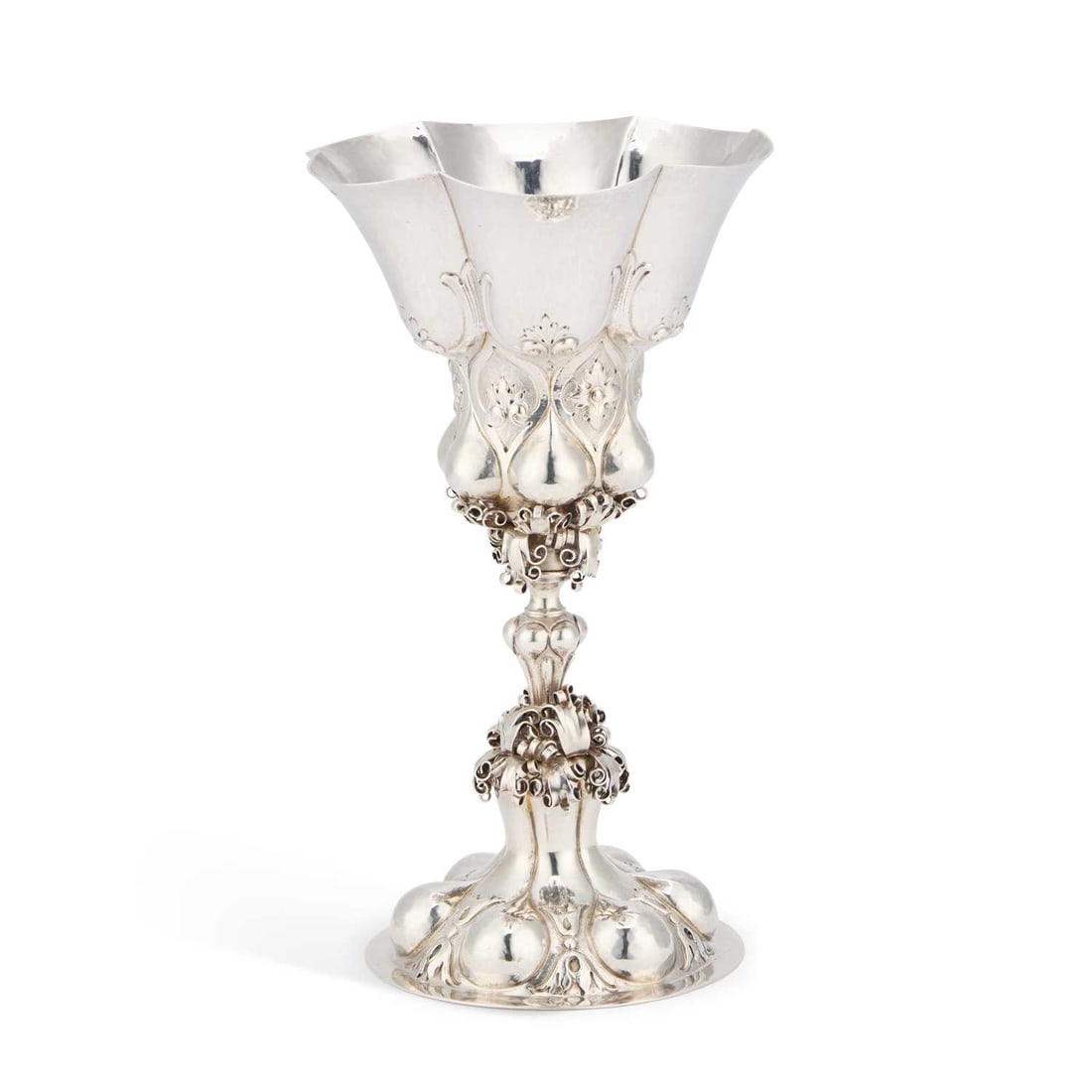 A GERMAN SILVER GOBLET: A GERMAN SILVER GOBLET Hanau, import marks, John George Piddington, London 1901, the lobed bowl raised on a knopped stem decorated with scrolls, issuing from a domed foot. 21cm high, 12 troy ounces