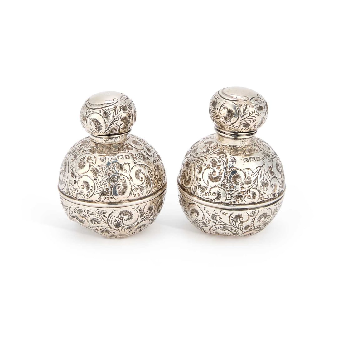 A PAIR OF GEORGE V SILVER-MOUNTED SCENT BOTTLES (1 of 2)