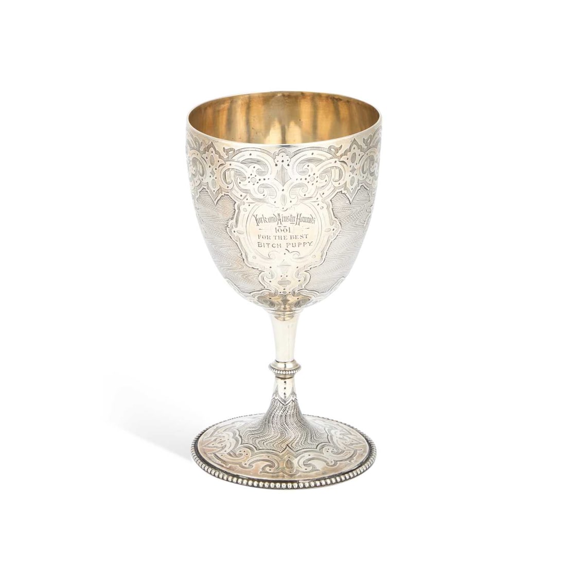 A VICTORIAN SILVER GOBLET: A VICTORIAN SILVER GOBLET by Robert Harper, London 1862, the ovoid bowl raised on a beaded knopped stem issuing from a spreading circular foot with a beaded rim, engraved in the 'Gothic' taste. 15.5cm