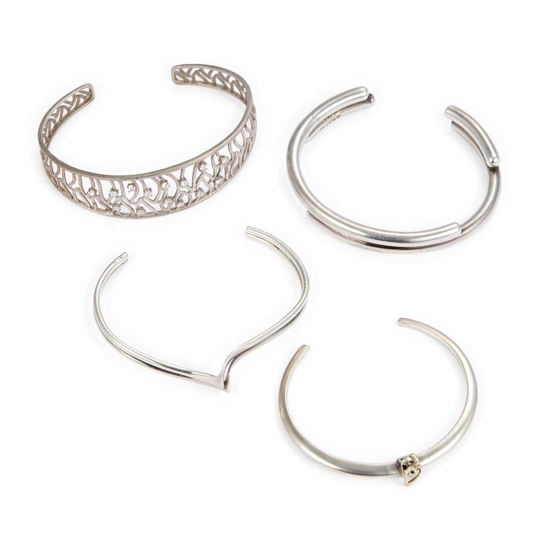 A GROUP OF SILVER BANGLES (1 of 1)