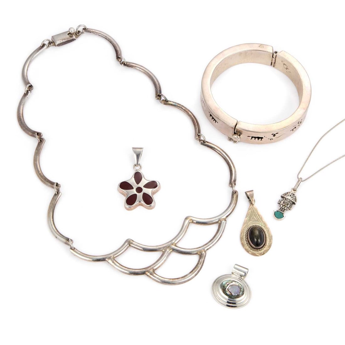 A GROUP OF MEXICAN SILVER JEWELLERY (1 of 1)