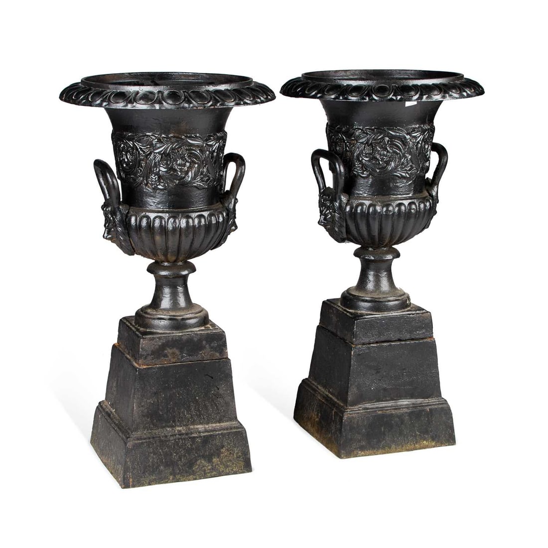 A PAIR OF CAST IRON URNS ON STANDS (1 of 1)