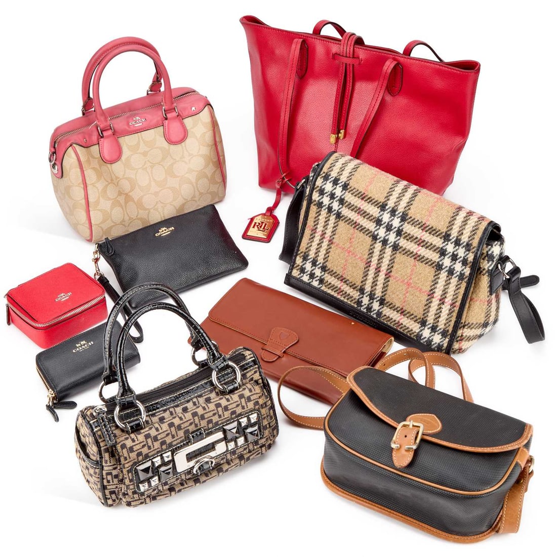 A GROUP OF DESIGNER BAGS AND ACCESSORIES: A GROUP OF DESIGNER BAGS AND ACCESSORIES including a black leather Coach clutch bag with yellow metal hardware; a red Coach travel jewellery box; a Burberry Check/ Tartan Plaid shoulder bag with black
