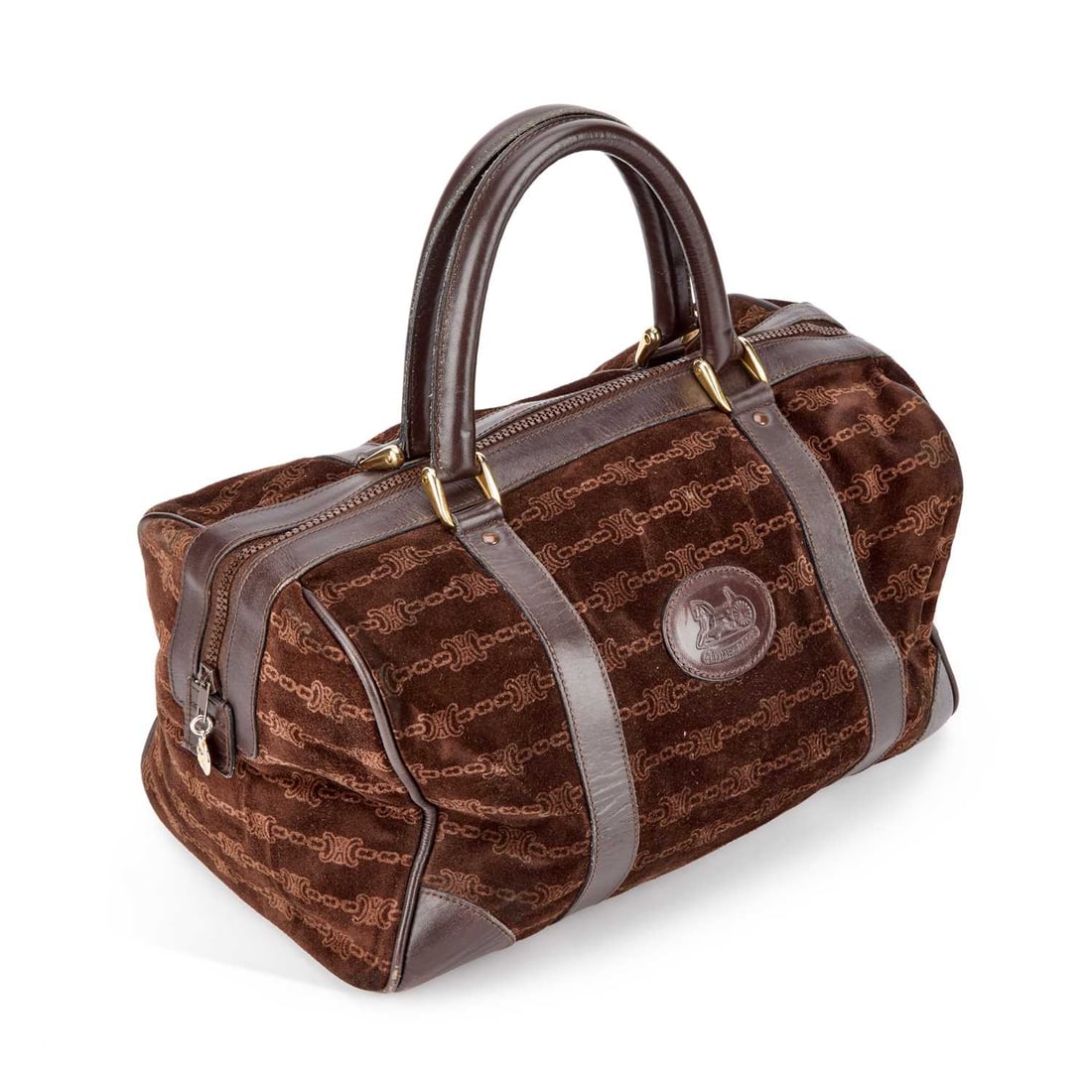 A CELINE BROWN MONOGRAM SUEDE BAG: A CELINE BROWN MONOGRAM SUEDE BAG monogrammed suede, with a pair of rolled handles and leather accents, yellow metal hardware, zip opening and one interior zip closure pocket. 32cm wide