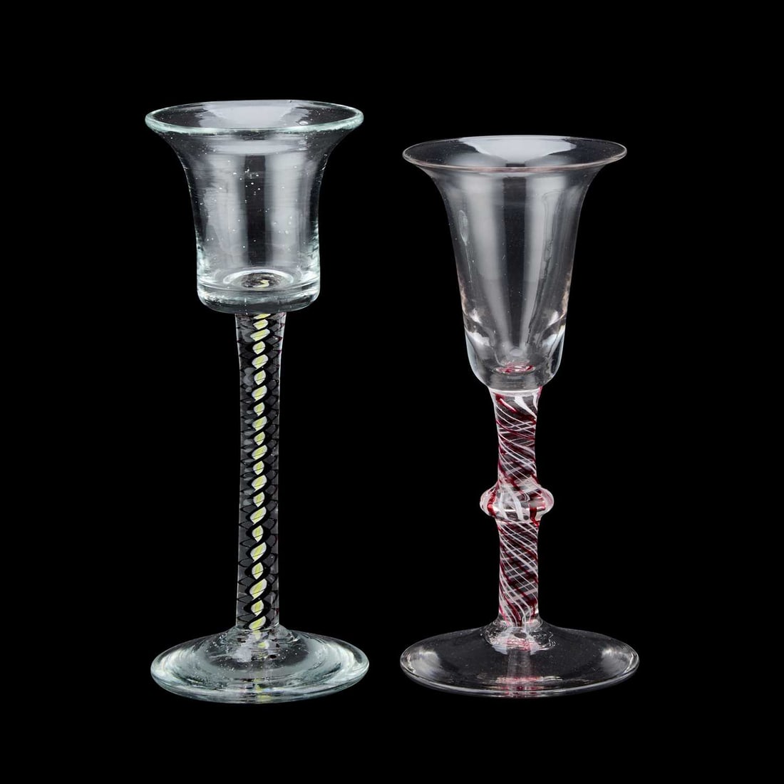 A RED COLOUR TWIST WINE GLASS 18TH CENTURY: A RED COLOUR TWIST WINE GLASS 18TH CENTURY with bell-bowl and conical foot; together with a multi-colour twist glass. (2) Tallest 17.5cm