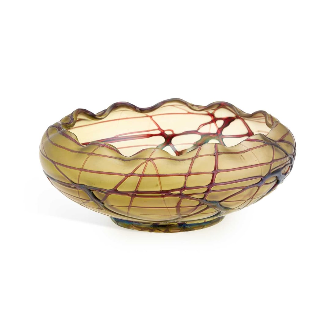 A LOETZ STYLE IRIDESCENT ART GLASS BOWL: A LOETZ STYLE IRIDESCENT ART GLASS BOWL early 20th Century, of circular form with a wavy rim, decorated with trailing purple threading over an amber ground. 21.5cm diameter