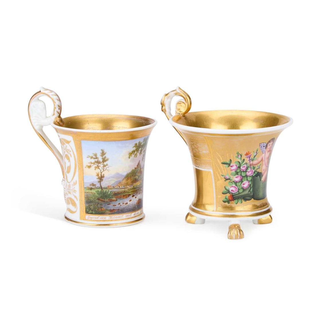 A BERLIN PORCELAIN CABINET CUP CIRCA 1820: A BERLIN PORCELAIN CABINET CUP CIRCA 1820 finely hand painted with a titled river landscape at Amte Hermsdorf, Schlesien, having an elaborate high handle and gilt interior, underglaze blue Sceptre mar