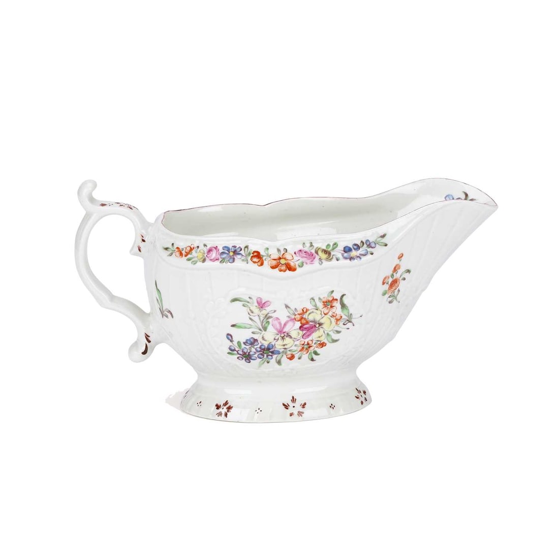 A WORCESTER PORCELAIN SAUCEBOAT CIRCA 1755: A WORCESTER PORCELAIN SAUCEBOAT CIRCA 1755 hand painted in polychrome enamels with floral panels complemented by further flowers to the borders and interior, puce motifs to the foot and handle. 19.5cm