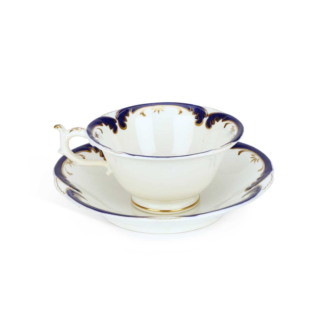 A ROCKINGHAM PORCELAIN CUP & SAUCER CIRCA 1835: A ROCKINGHAM PORCELAIN CUP & SAUCER CIRCA 1835 both decorated with blue and gilded border crescents, pattern mark 1171 and standard puce griffin mark. Cup 5cm high