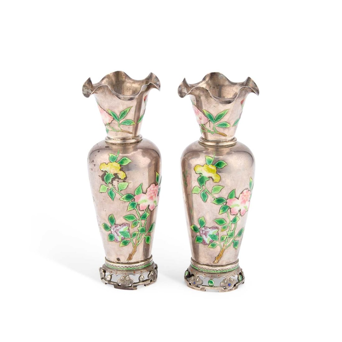 A PAIR OF CHINESE SILVER AND ENAMEL VASES: A PAIR OF CHINESE SILVER AND ENAMEL VASES each of baluster form with flared necks and undulating rims, the bodies and necks enamelled with peonies, raised on pierced feet with Ruyi picked out in ename