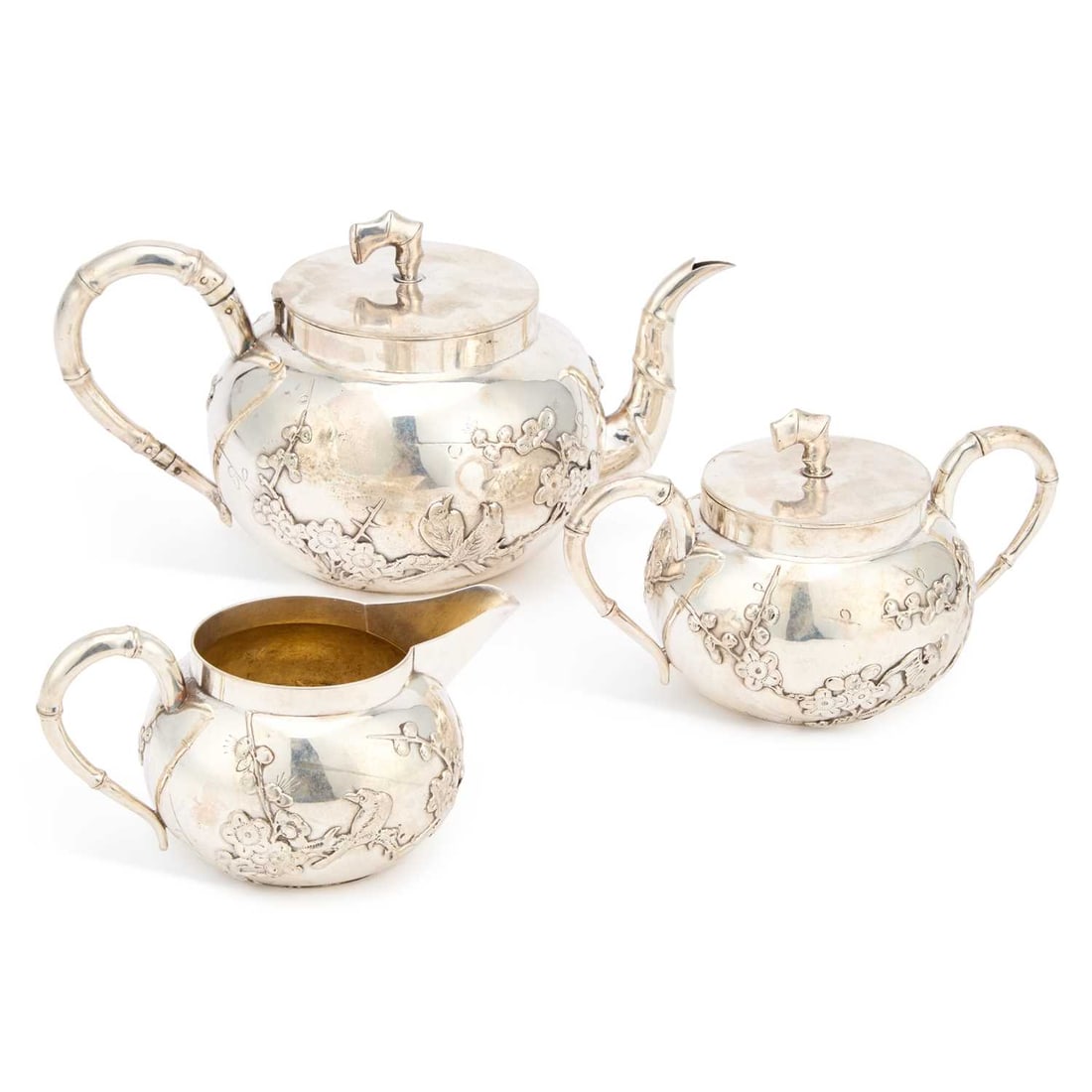 A CHINESE EXPORT SILVER THREE-PIECE TEA SERVICE (1 of 2)