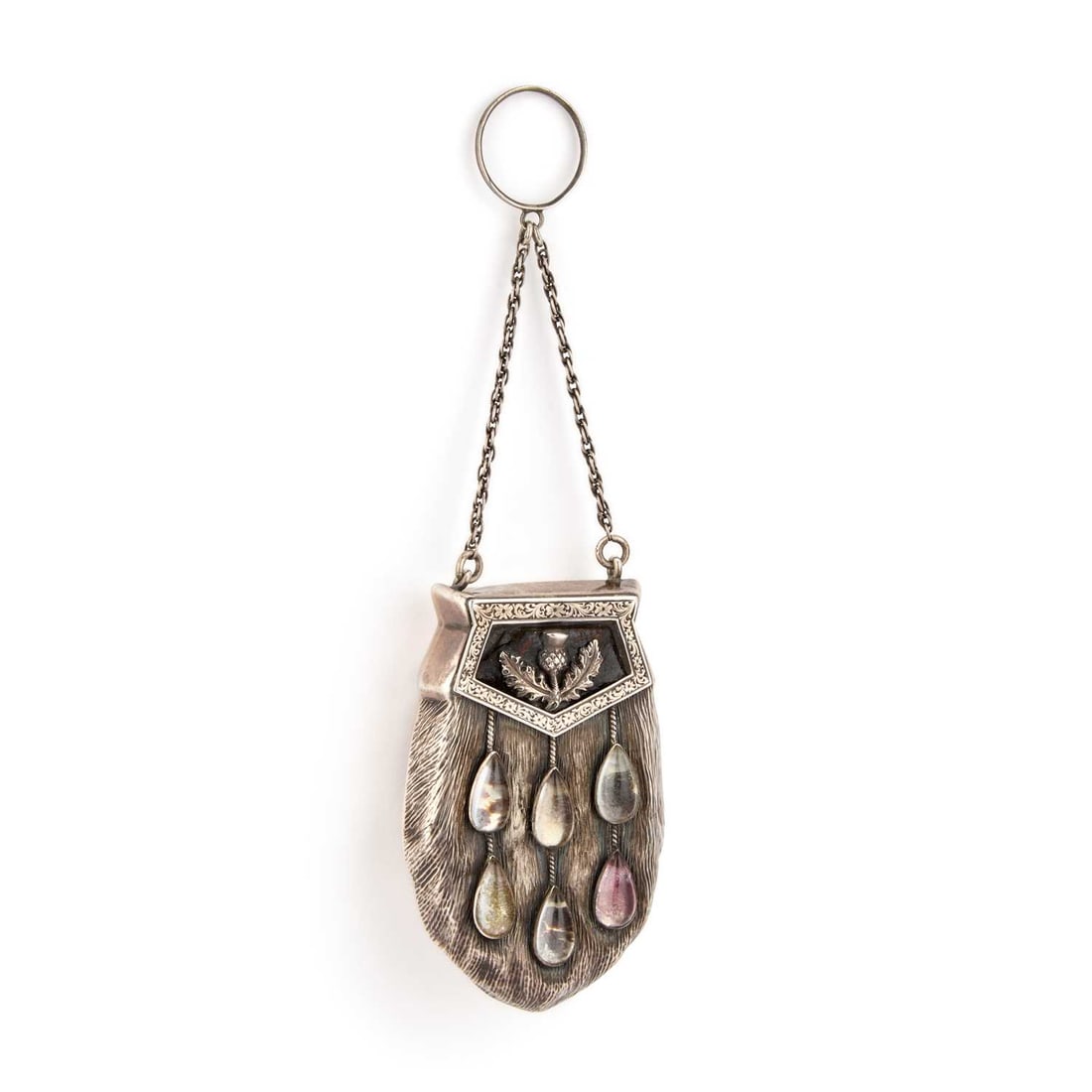 A 19TH CENTURY SCOTTISH SILVER NOVELTY VINAIGRETTE: A 19TH CENTURY SCOTTISH SILVER NOVELTY VINAIGRETTE unmarked, modelled as a sporran, with textured decoration and applied with six foil back rock crystal and a thistle, the hinged reverse open to revea