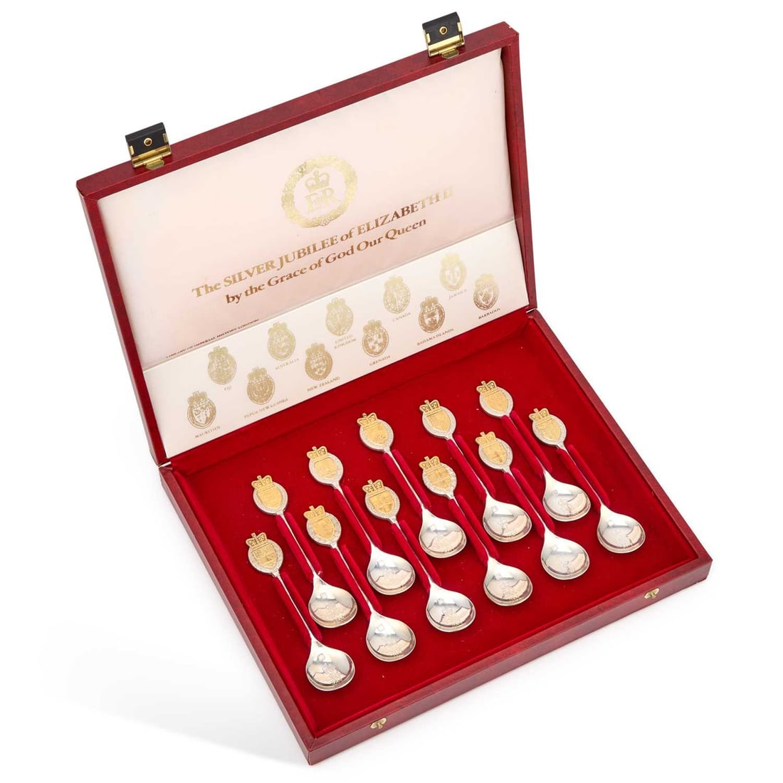 A SET OF ELEVEN LIMITED EDITION PARCEL-GILT SILVER ROYAL COMMEMORATIVE SPOONS ROYAL SILVER JUBILEE: A SET OF ELEVEN LIMITED EDITION PARCEL-GILT SILVER ROYAL COMMEMORATIVE SPOONS ROYAL SILVER JUBILEE SPOONS maker T M, Sheffield 1977, no. 220 of 2,000, cased with certificate. 13cm long, 11.9 troy ounc