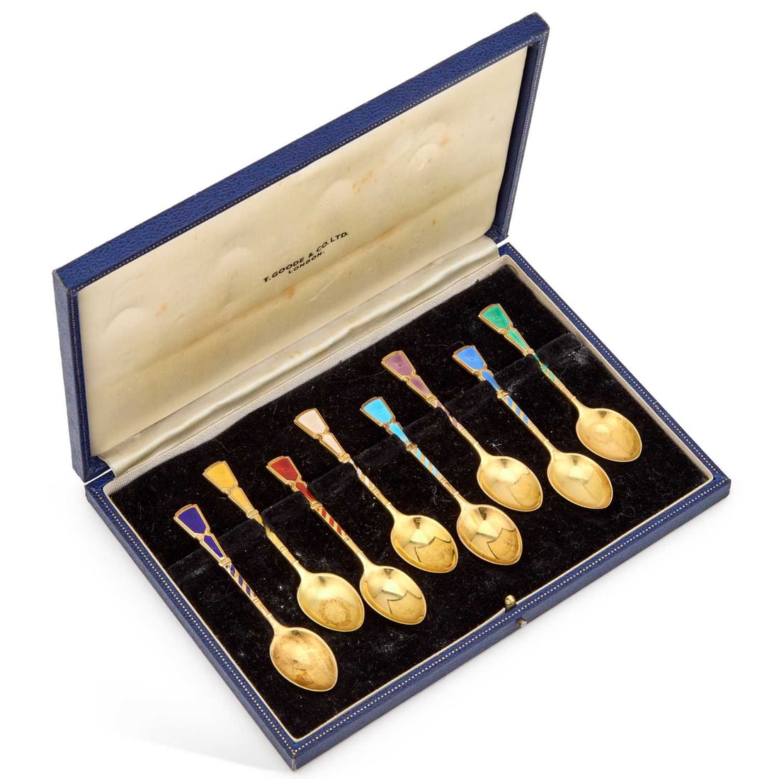 A SET OF EIGHT ELIZABETH II SILVER-GILT AND ENAMEL COFFEE SPOONS: A SET OF EIGHT ELIZABETH II SILVER-GILT AND ENAMEL COFFEE SPOONS by Turner & Simpson Ltd, Birmingham 1968, each stem decorated with a different colour enamel, in a Thomas Goode case. 9.7cm long, 3