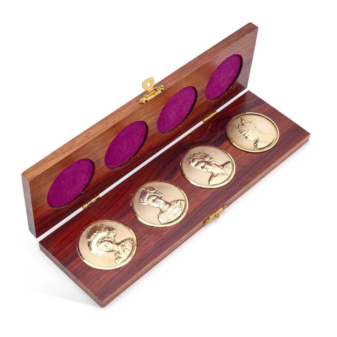 A SET OF FOUR ELIZABETH II SILVER JUBILEE MEDALLIONS: A SET OF FOUR ELIZABETH II SILVER JUBILEE MEDALLIONS by Toye, Kenning & Spencer, Birmingham 1977, in original wooden box. 4cm diameter, 5 troy ounces gross