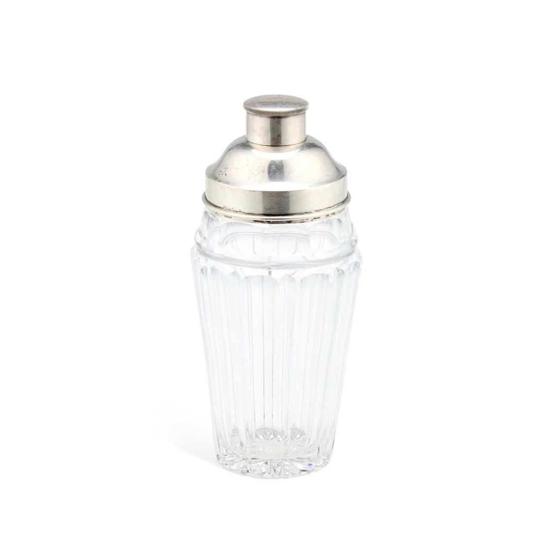 AN ART DECO GERMAN SILVER-MOUNTED CUT-GLASS COCKTAIL SHAKER: AN ART DECO GERMAN SILVER-MOUNTED CUT-GLASS COCKTAIL SHAKER of faceted tapering form with fluted sides below a panel-cut shoulder, 800 standard. 21cm high