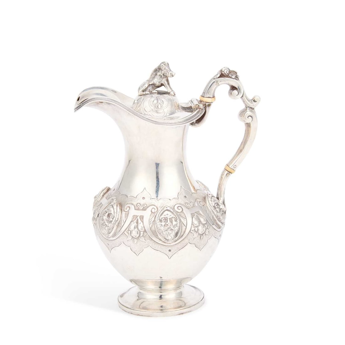 A VICTORIAN SILVER EWER: A VICTORIAN SILVER EWER by George Angell & Co, London 1868, of baluster form, the hinged domed cover surmounted by the cast figure of a boar, the body with applied cast masks within strapwork on a