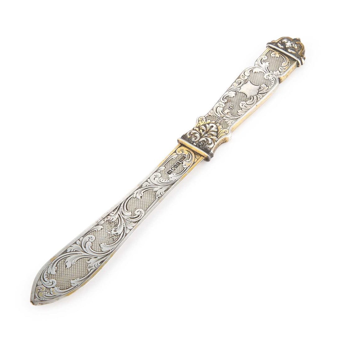 A VICTORIAN SILVER LETTER OPENER: A VICTORIAN SILVER LETTER OPENER by Taylor & Perry, Birmingham 1849, hallmarked silver blade and handle, decorated with scrolling acanthus and engine-turning. 23cm long, 1.7 troy ounces