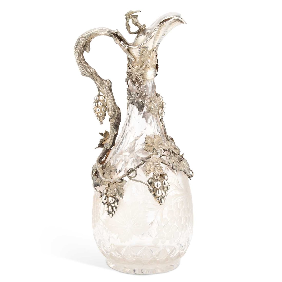 A VICTORIAN SILVER-MOUNTED ETCHED GLASS CLARET JUG: A VICTORIAN SILVER-MOUNTED ETCHED GLASS CLARET JUG by Edward & John Barnard, London 1866, the ewer of baluster form with a naturalistic vine handle, the glass body etched with stars. 35cm high
