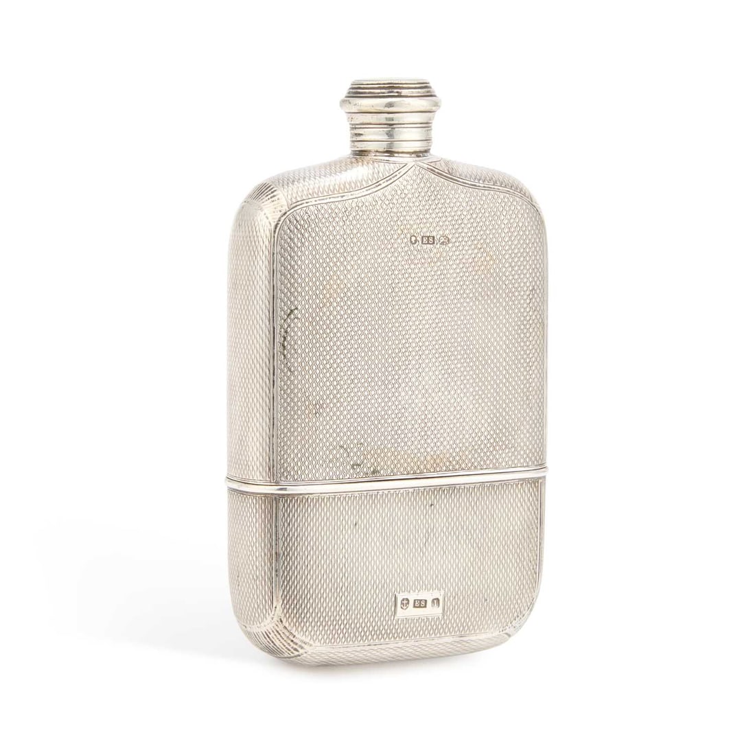 A VICTORIAN ENGINE-TURNED SILVER HIP FLASK: A VICTORIAN ENGINE-TURNED SILVER HIP FLASK by Edward Smith, Birmingham 1857, of rounded rectangular form with a screw cap and detachable cup to the base. 14.5cm long, 8cm wide, 7.5 troy ounces