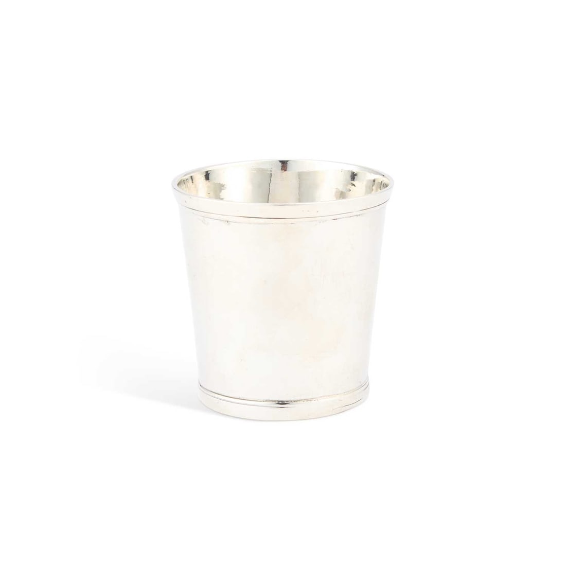 A GEORGE III SILVER BEAKER: A GEORGE III SILVER BEAKER by Richard Richardson, Chester 1786, of tapering cylindrical form. 7.5cm high, 4 troy ounces