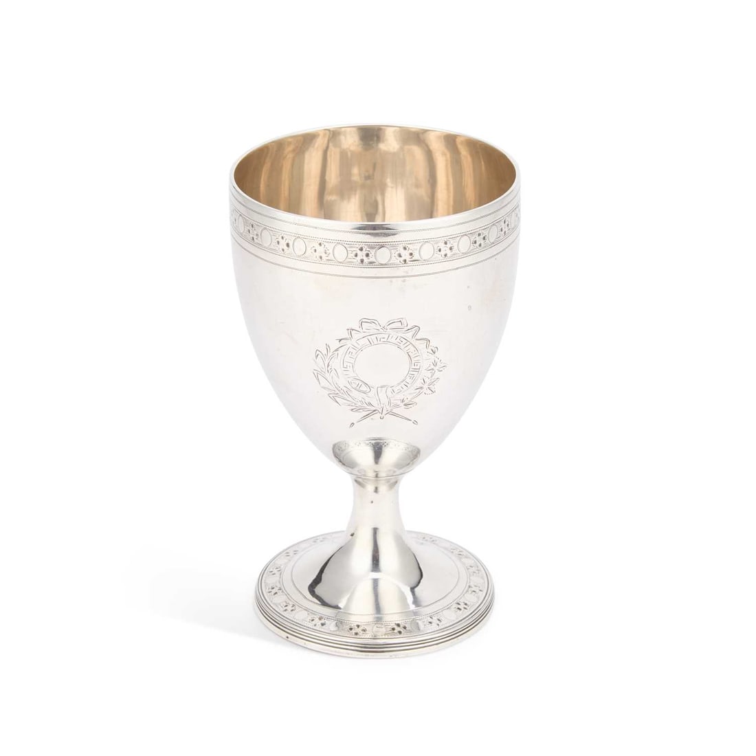 A GEORGE III SILVER GOBLET: A GEORGE III SILVER GOBLET by Solomon Hougham, London 1795, of ovoid form with a pedestal foot, bright-cut engraved with borders of ovals and florettes, the bowl further engraved with two vacant ribbo