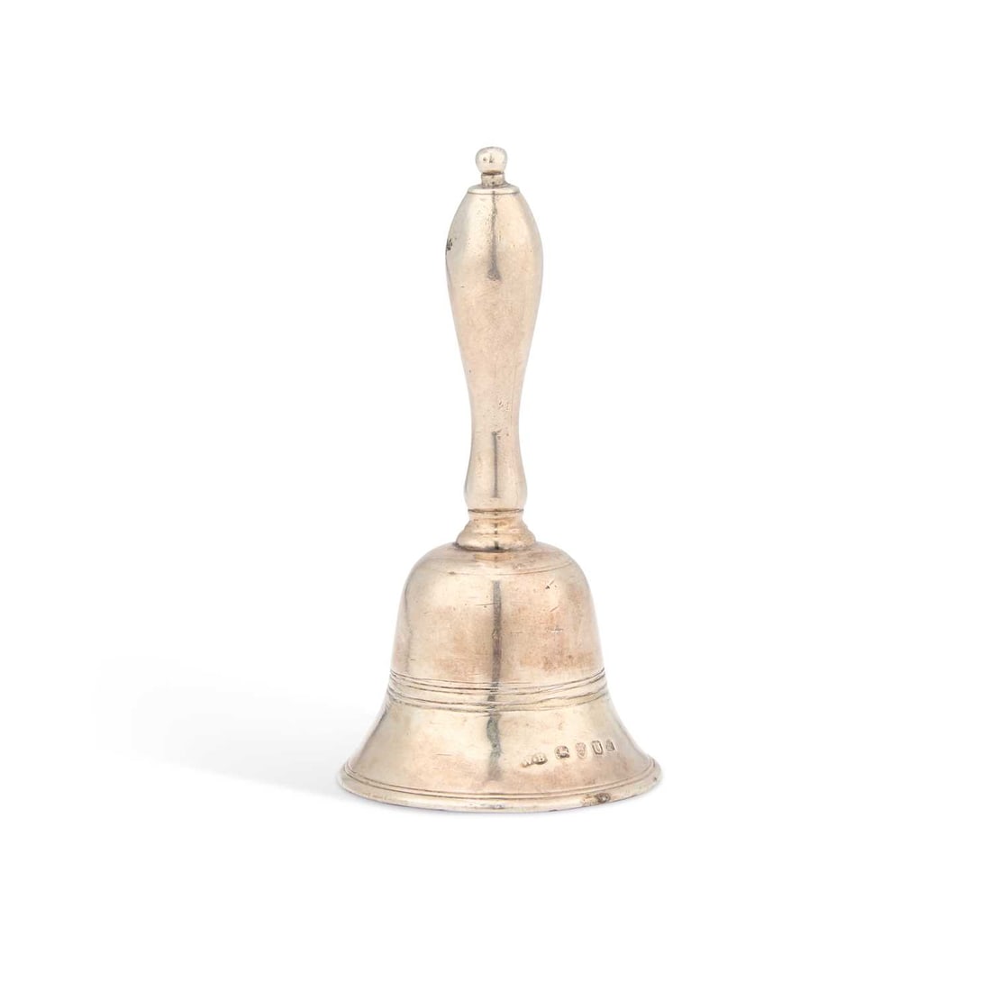 A GEORGE III SILVER TABLE BELL: A GEORGE III SILVER TABLE BELL by William Bateman I, London 1815, decorated with a single band of ribbing. 11.2cm high, 3.8 troy ounces