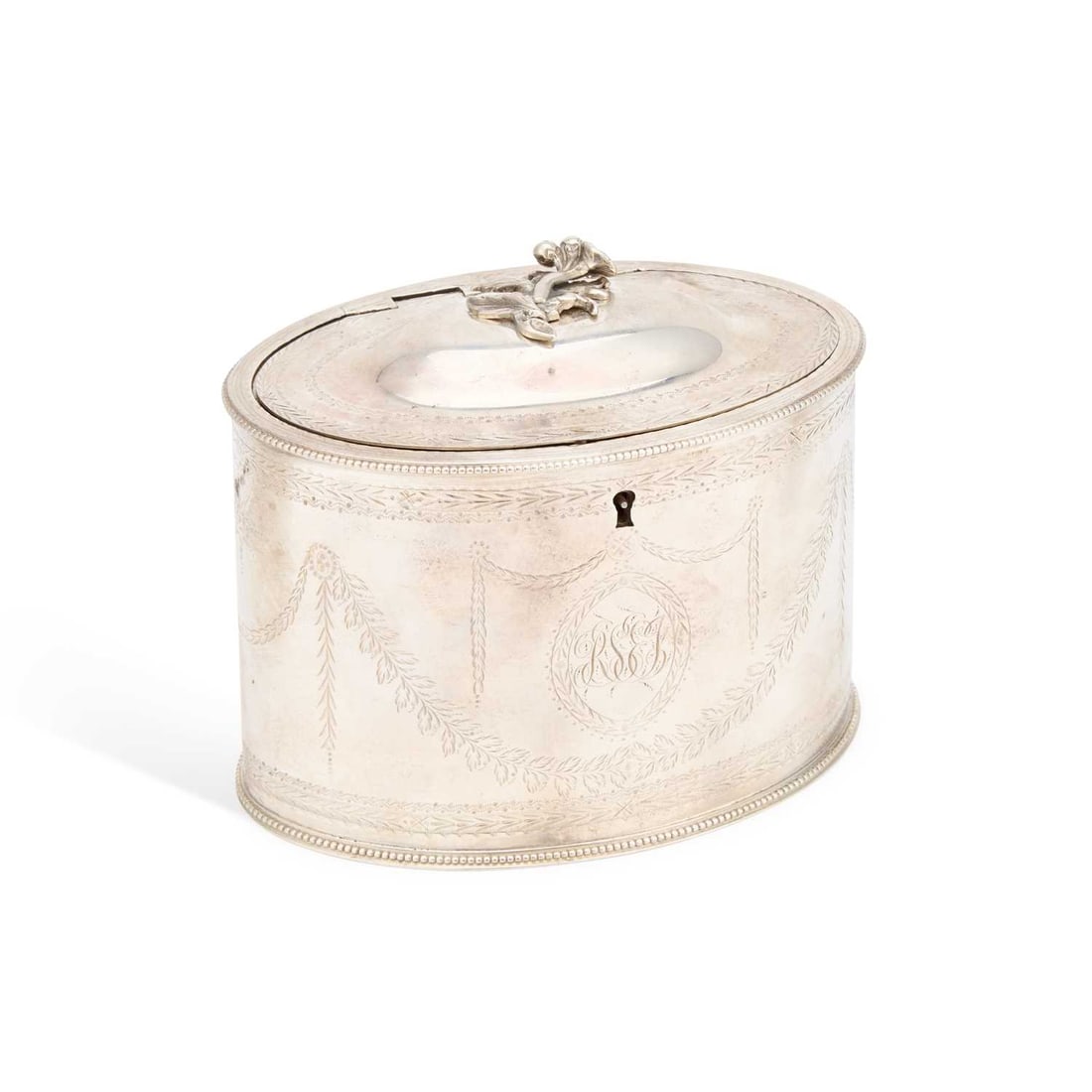 A GEORGE III SILVER TEA CADDY: A GEORGE III SILVER TEA CADDY by Thomas Pratt & Arthur Humphries, London 1782, oval form, the domed lid with a floriform knop and flush hinge, bright-cut engraved with swags and garlands between b