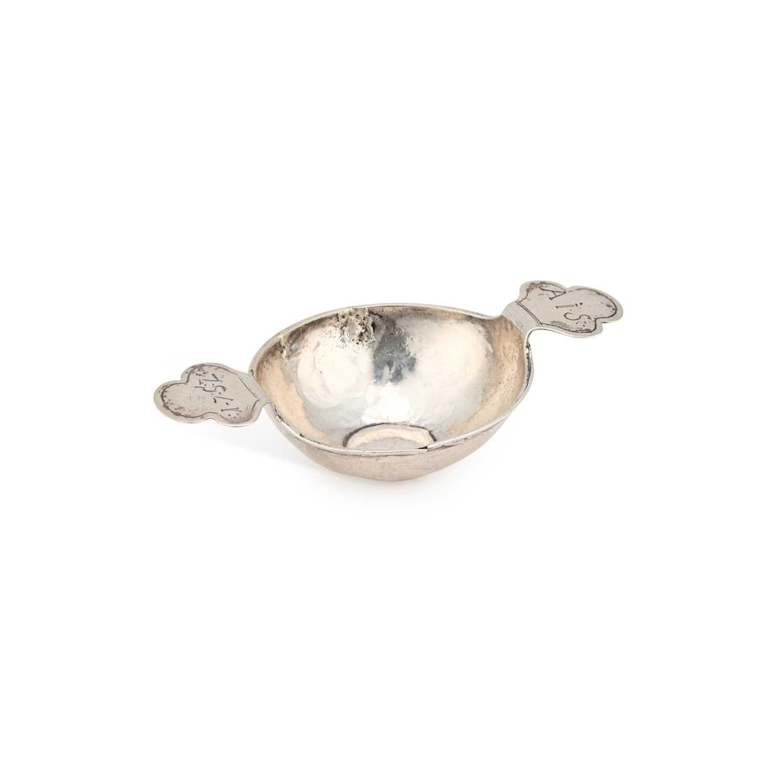 AN 18TH CENTURY TWIN HANDLED QUAICH: AN 18TH CENTURY TWIN HANDLED QUAICH the trefoil handles inscribed AIS 1752. 12.5cm wide, 1.8 troy ounces