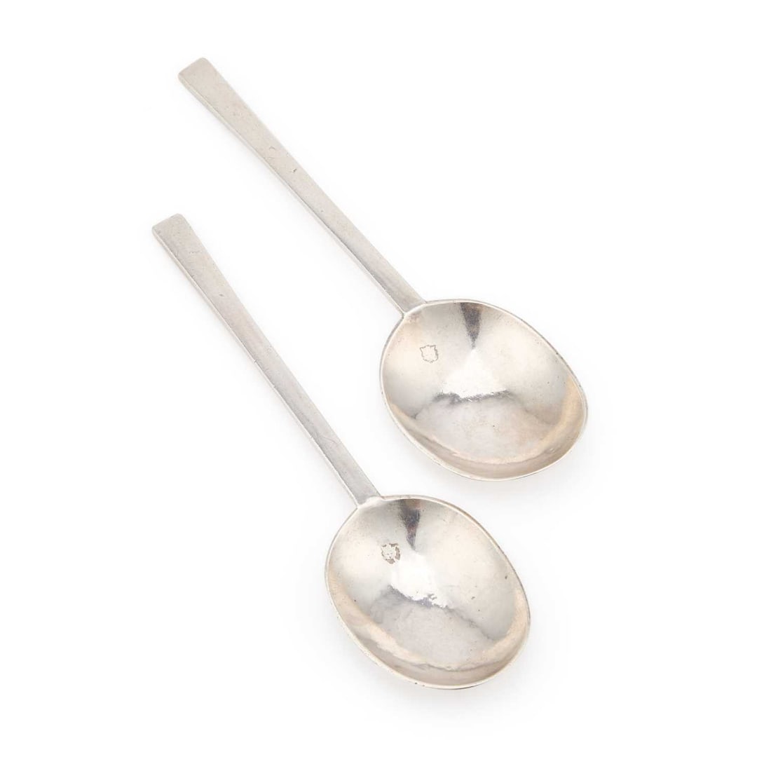 A PAIR OF COMMONWEALTH SILVER PURITAN SPOONS: A PAIR OF COMMONWEALTH SILVER PURITAN SPOONS by Stephen Venables I, London 1657. (2) 17cm long, 3.2 troy ounces gross