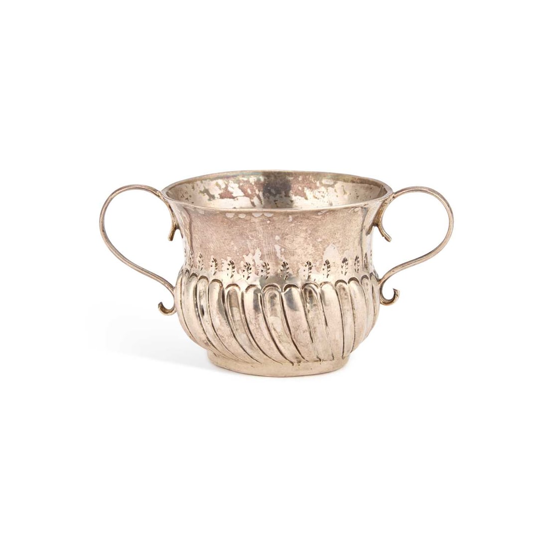 A QUEEN ANNE SILVER 'TOY' MINIATURE PORRINGER: A QUEEN ANNE SILVER 'TOY' MINIATURE PORRINGER by Matthew Pickering, London 1707, with twin scroll-form handles, partially reeded. 7.3cm wide across handles